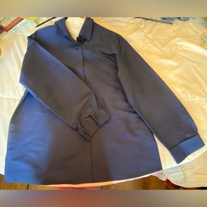 Perfect for the upcoming holiday season!  Navy raw silk top with knot buttons